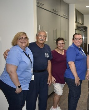 Virginia Smith with other food prep staff