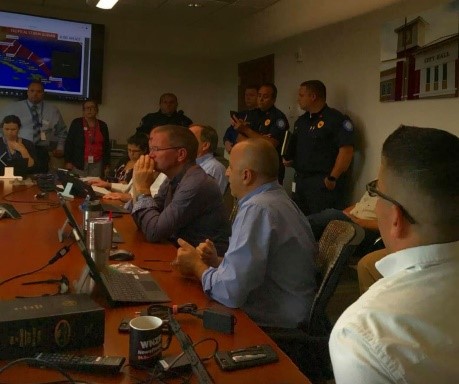 Capt. Ascone stands by for a storm briefing