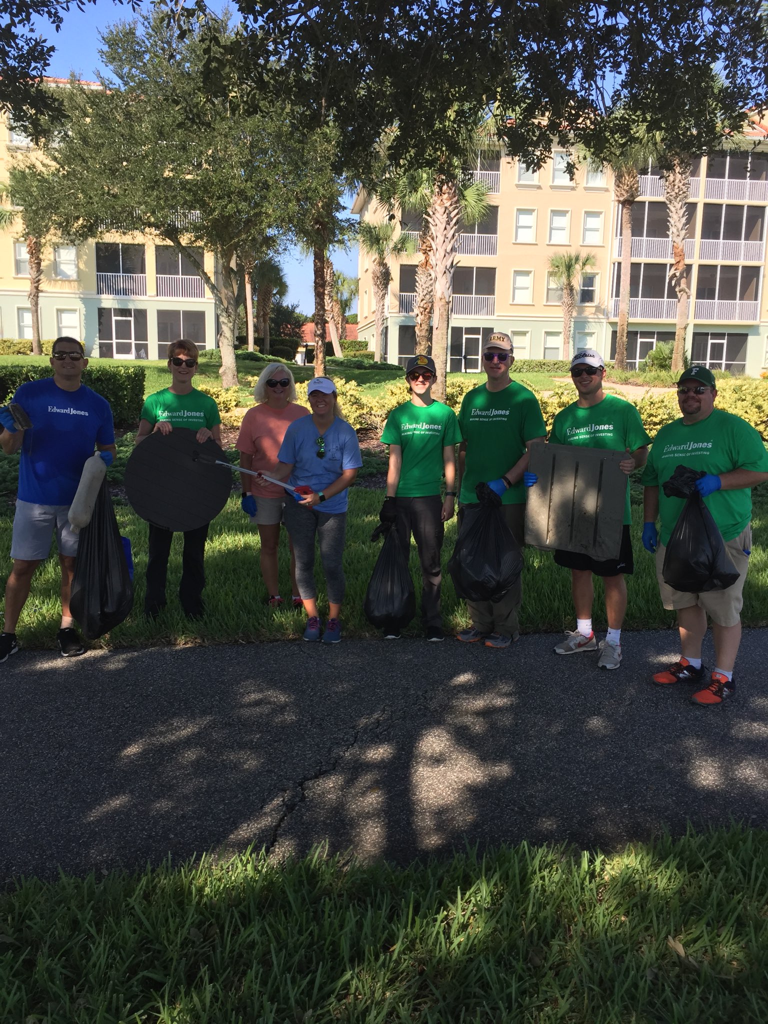 A Girl Scout volunteering in cleanup at Waterfront Park